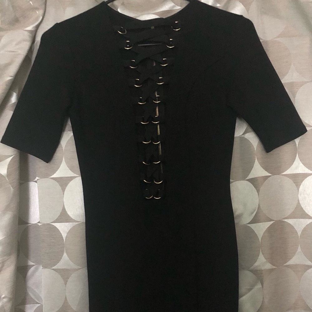 Chic black dress with lace up front